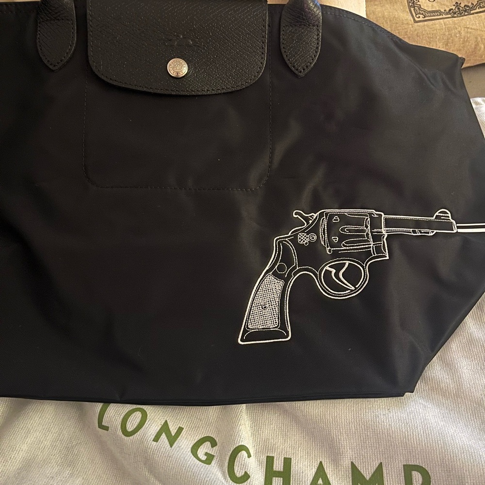 Limited Edition Longchamp Le Pliage with embroidered gun/bang